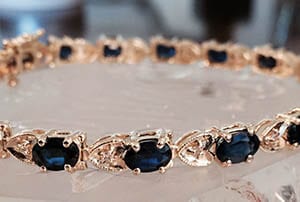 Sapphire and gold tennis bracelet