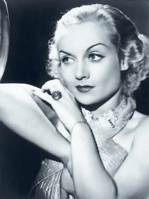 Carole Lombard wearing her star sapphire ring, ©Corbis