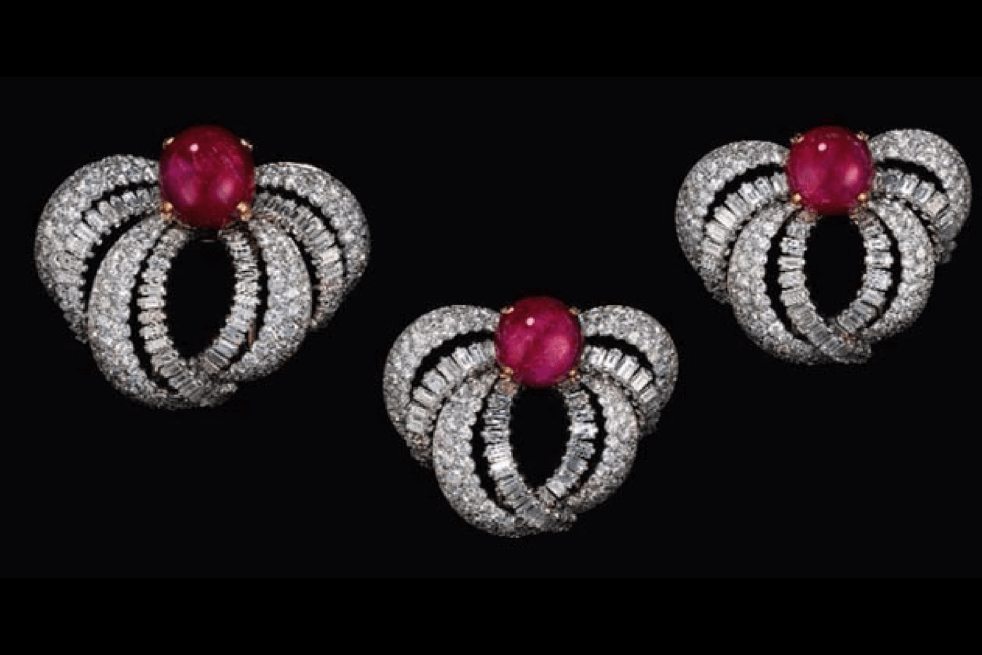 Princess Grace of Monaco’s set of ruby, diamond, platinum and gold clip brooches by Cartier Paris. 