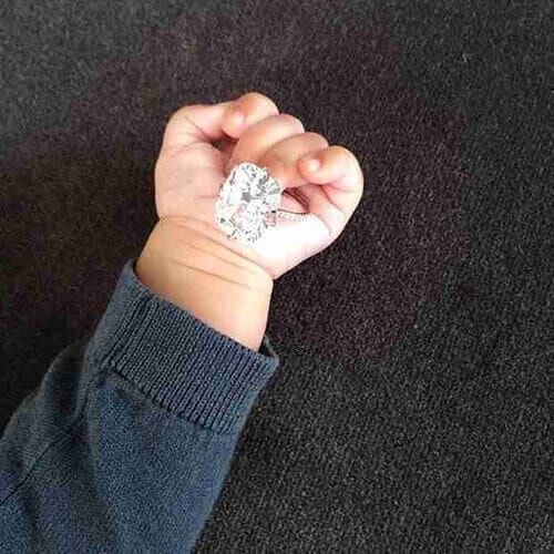 North West holds Kim Kardashian's Ring