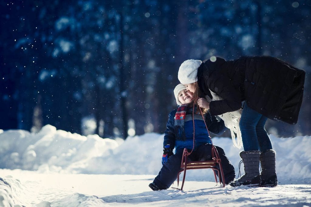 snow playing - ways to coparent during holidays