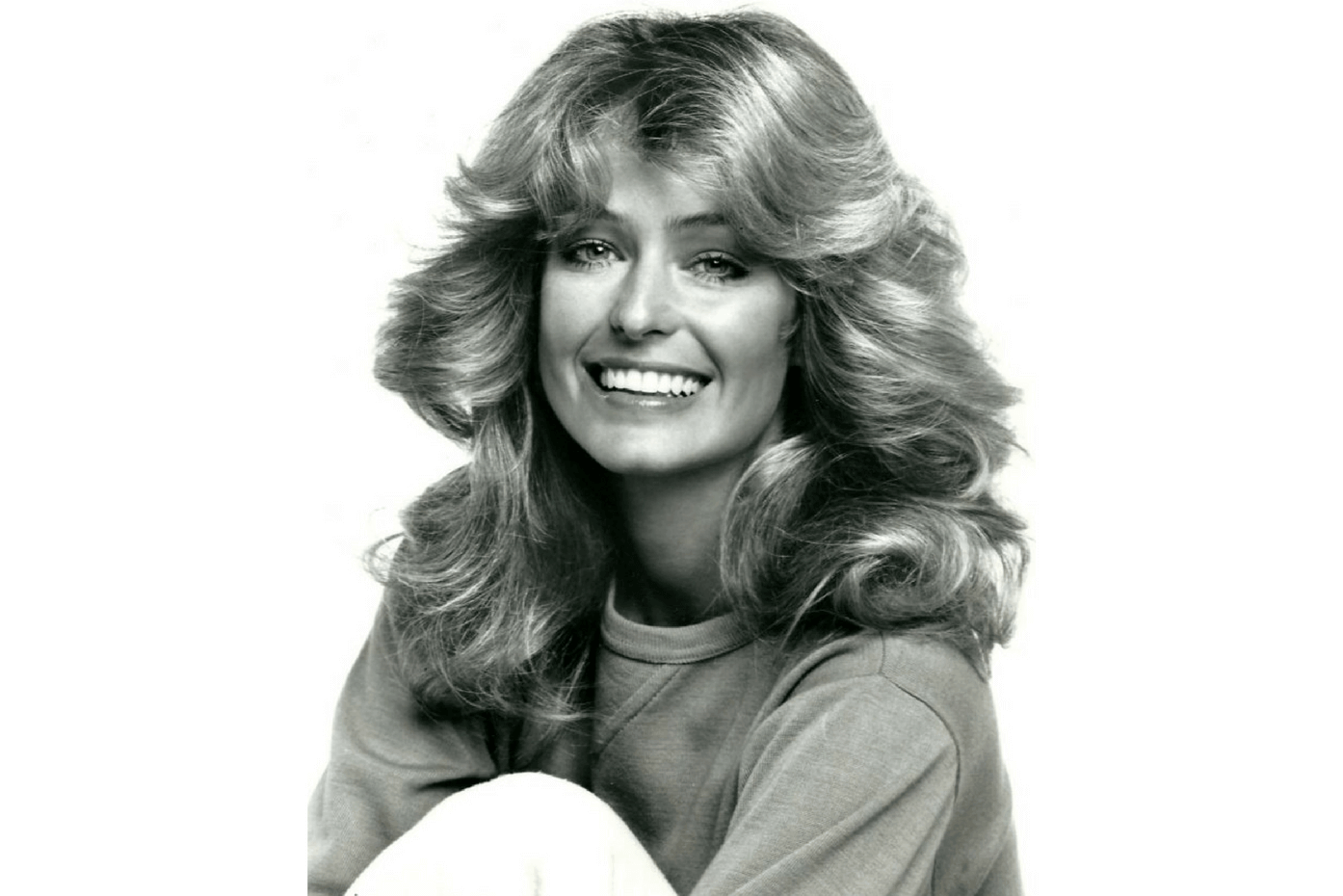 Farrah Fawcett's feathered hairdo helped her become a 1970s style icon. 